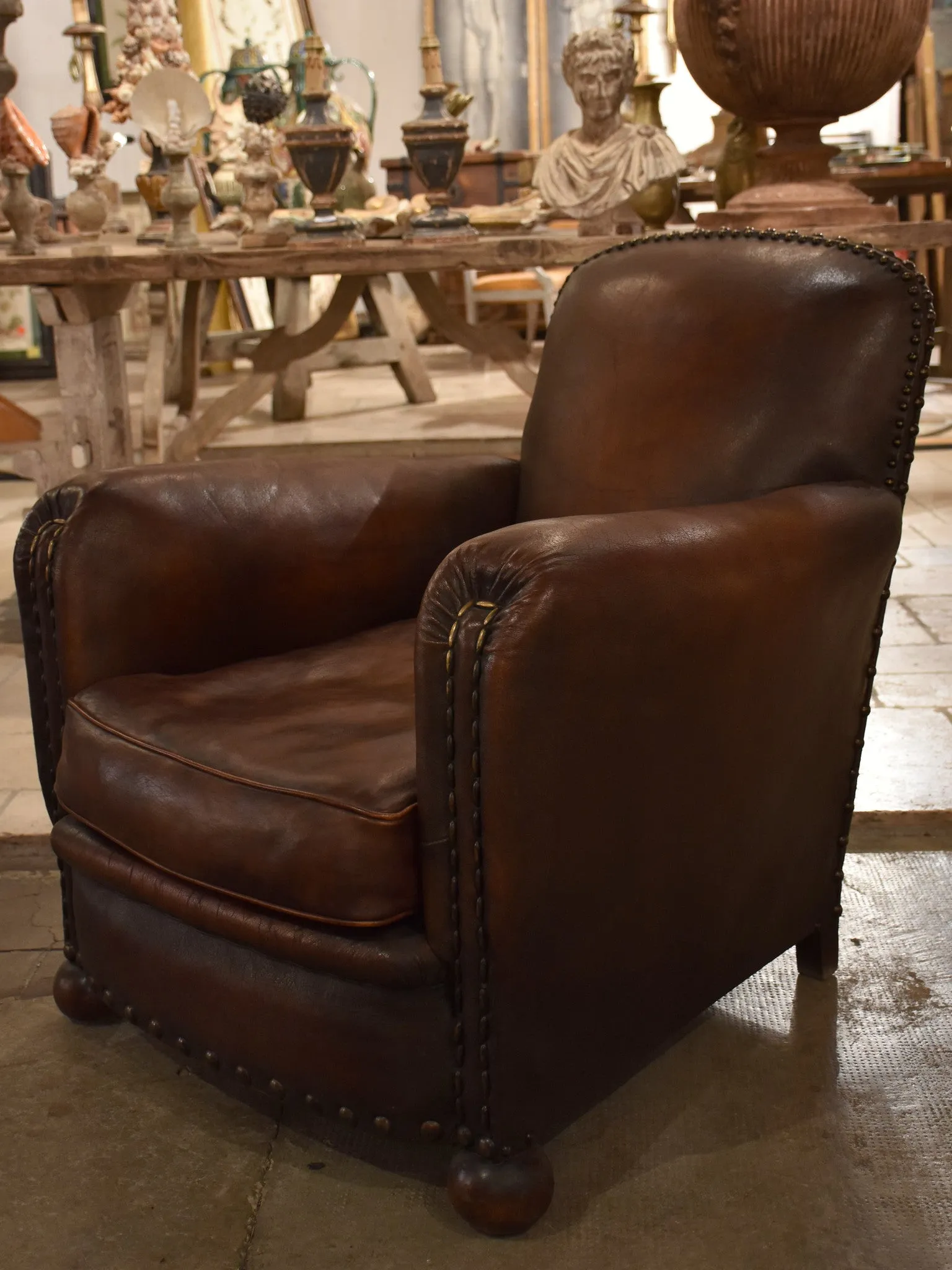 Dark French leather studded club chair - clouté